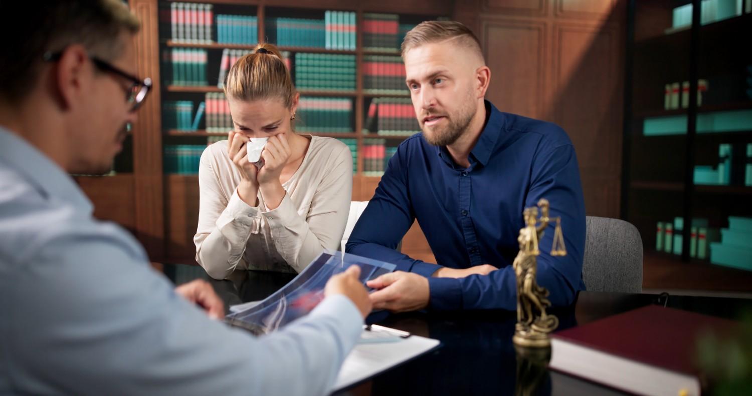 Attorney consulting clients on wrongful death claim requirements in office St. Augustine, FL